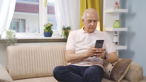 Disappointed-old-man-texting.
